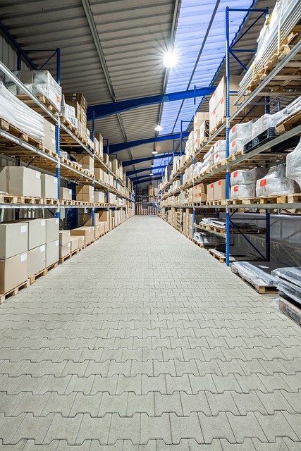 long aisle of warehouse racking holding stock